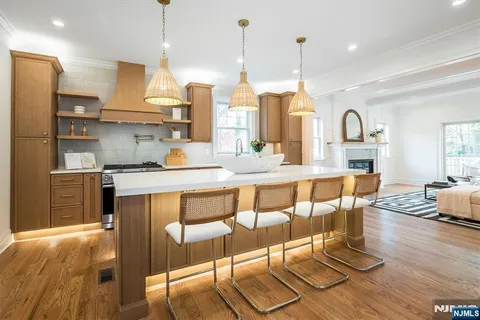 a kitchen with a stove and a cabinets