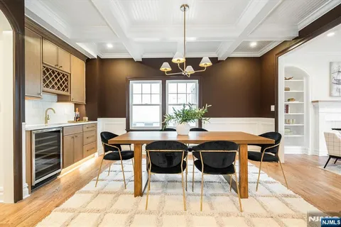 a view of a dining room with furniture and window
