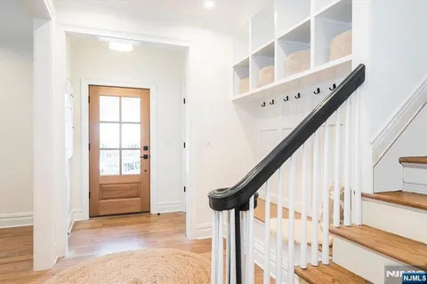 a view of an entryway with staircase
