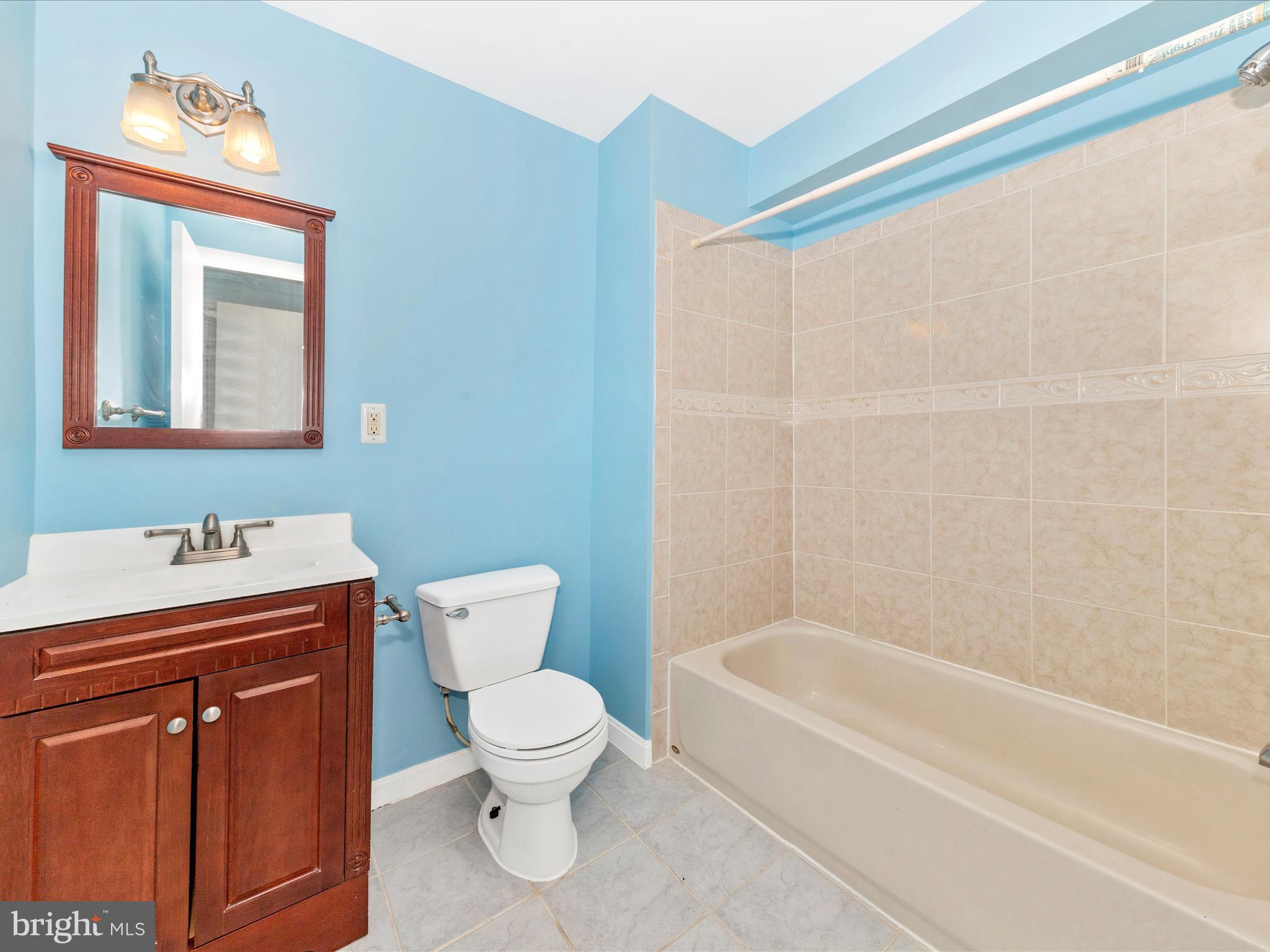 314 Crescendo Way Silver Spring, MD 20901 - Photo 38 of 57 a white toilet sitting next to a bathroom sink