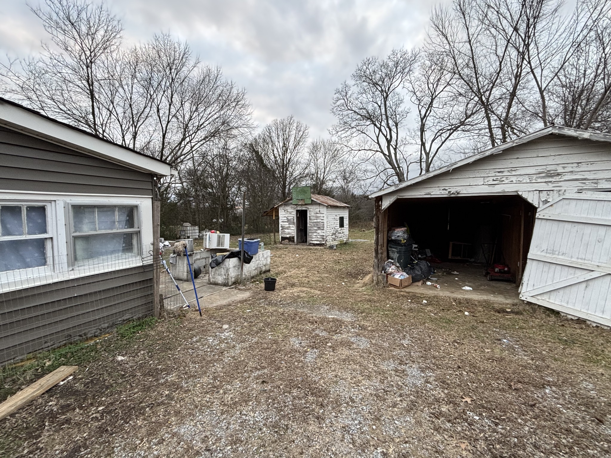 1376 Rutledge Ln. Lebanon, TN 37087 - Photo 15 of 16 a view of a house with a yard and large tree