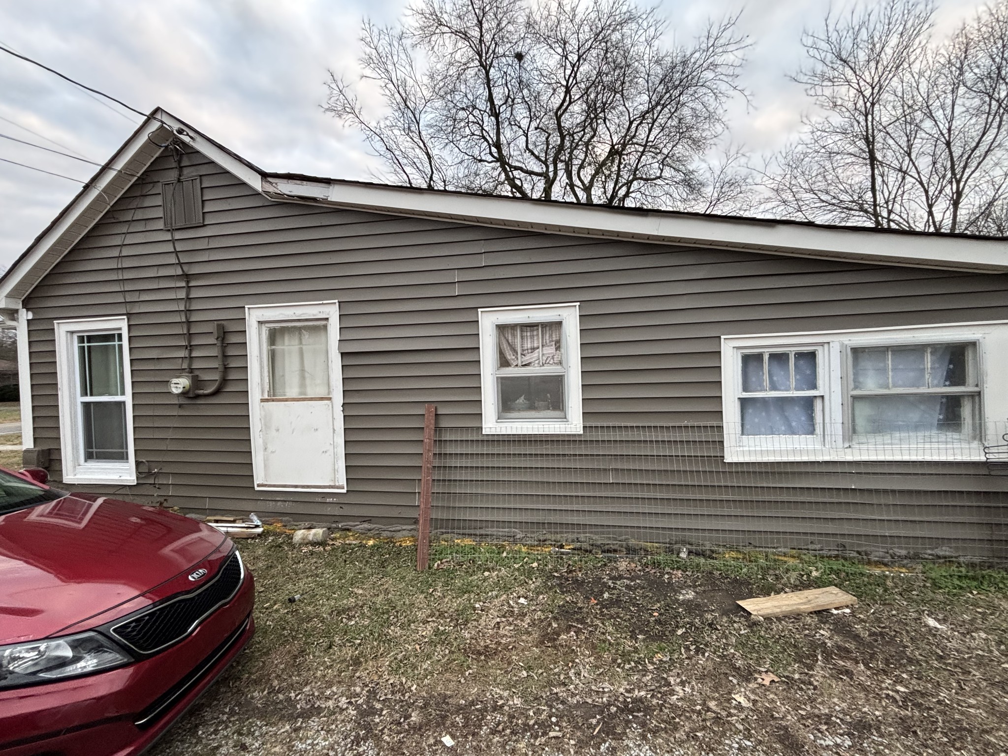 1376 Rutledge Ln. Lebanon, TN 37087 - Photo 16 of 16 a front view of a house with a yard