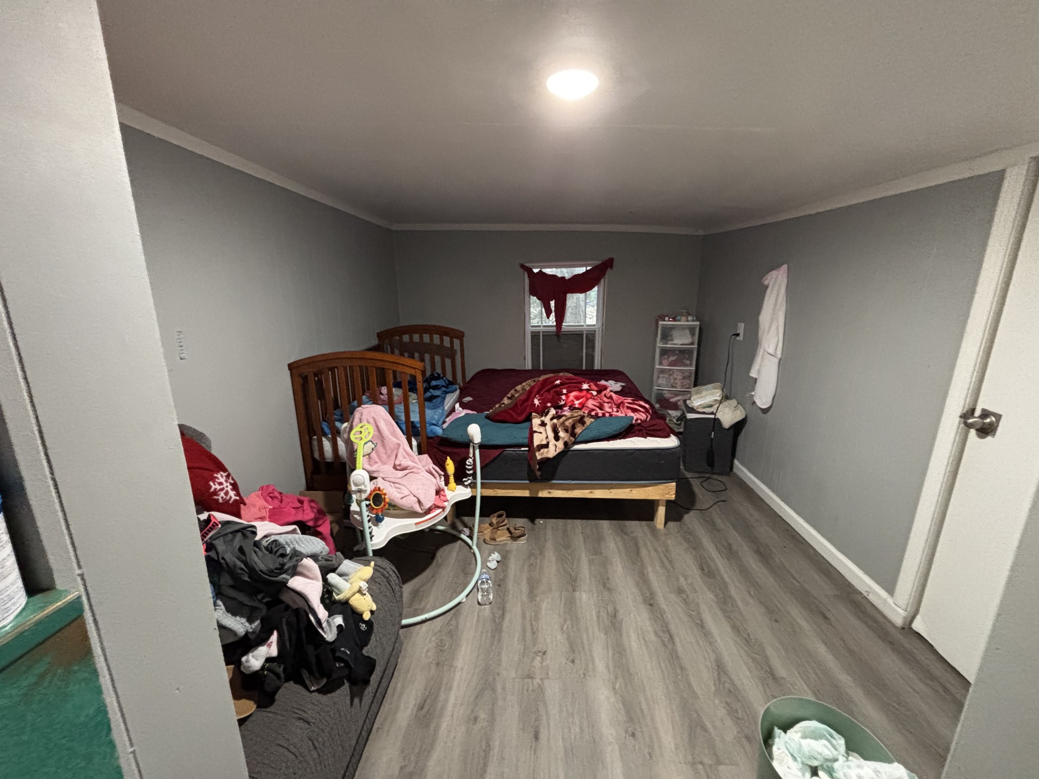 1376 Rutledge Ln. Lebanon, TN 37087 - Photo 4 of 16 a bedroom with furniture and a wooden floor