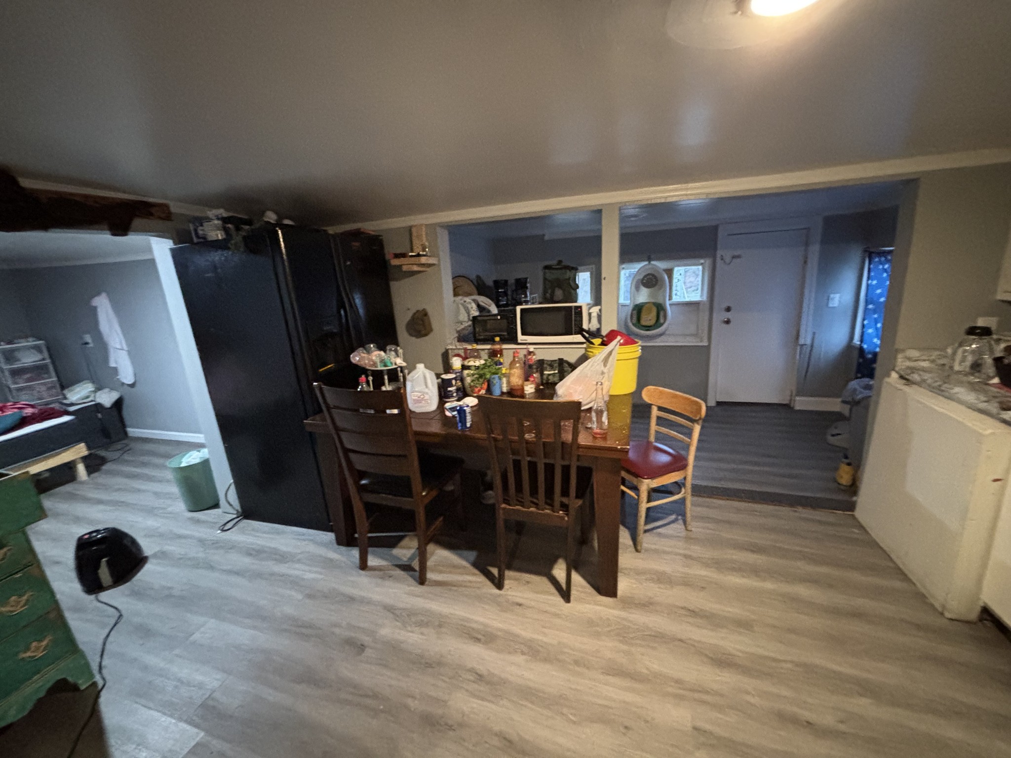 1376 Rutledge Ln. Lebanon, TN 37087 - Photo 8 of 16 a view of a dining room with furniture and wooden floor