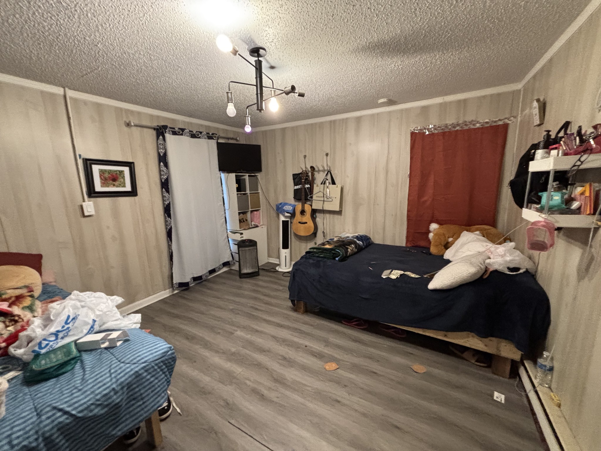 1376 Rutledge Ln. Lebanon, TN 37087 - Photo 9 of 16 a bedroom with a bed window and walk in closet