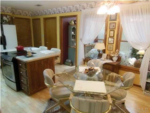 520 Turnberry Road Cantonment, FL 32533 - Photo 9 of 25 Spacious Kitchen with Wood Laminate Floor