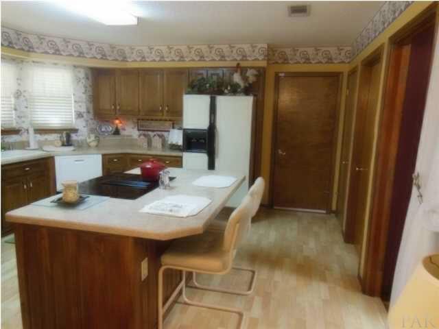 520 Turnberry Road Cantonment, FL 32533 - Photo 10 of 25 Island with Downdraft Cooktop