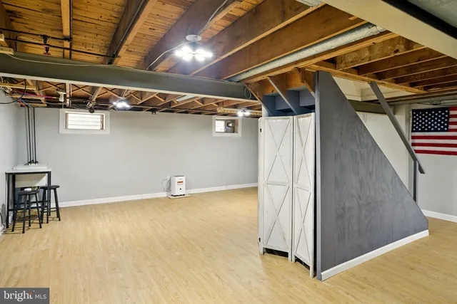 a view of a room with wooden walls