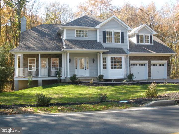 128 Cranbury Road Princeton Junction, NJ 08550 - Photo 1 of 25 a view of a house with a swimming pool