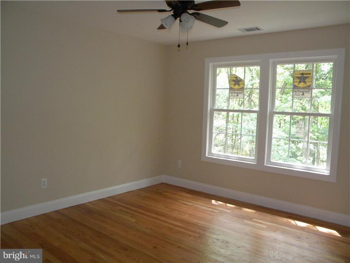 128 Cranbury Road Princeton Junction, NJ 08550 - Photo 24 of 25 an empty room with a window