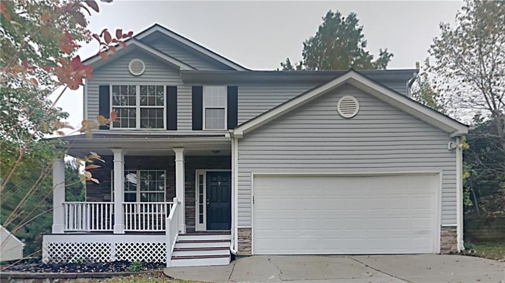 283 Bainbridge Circle Dallas, GA 30132 - Photo 1 of 1 a front view of a house with