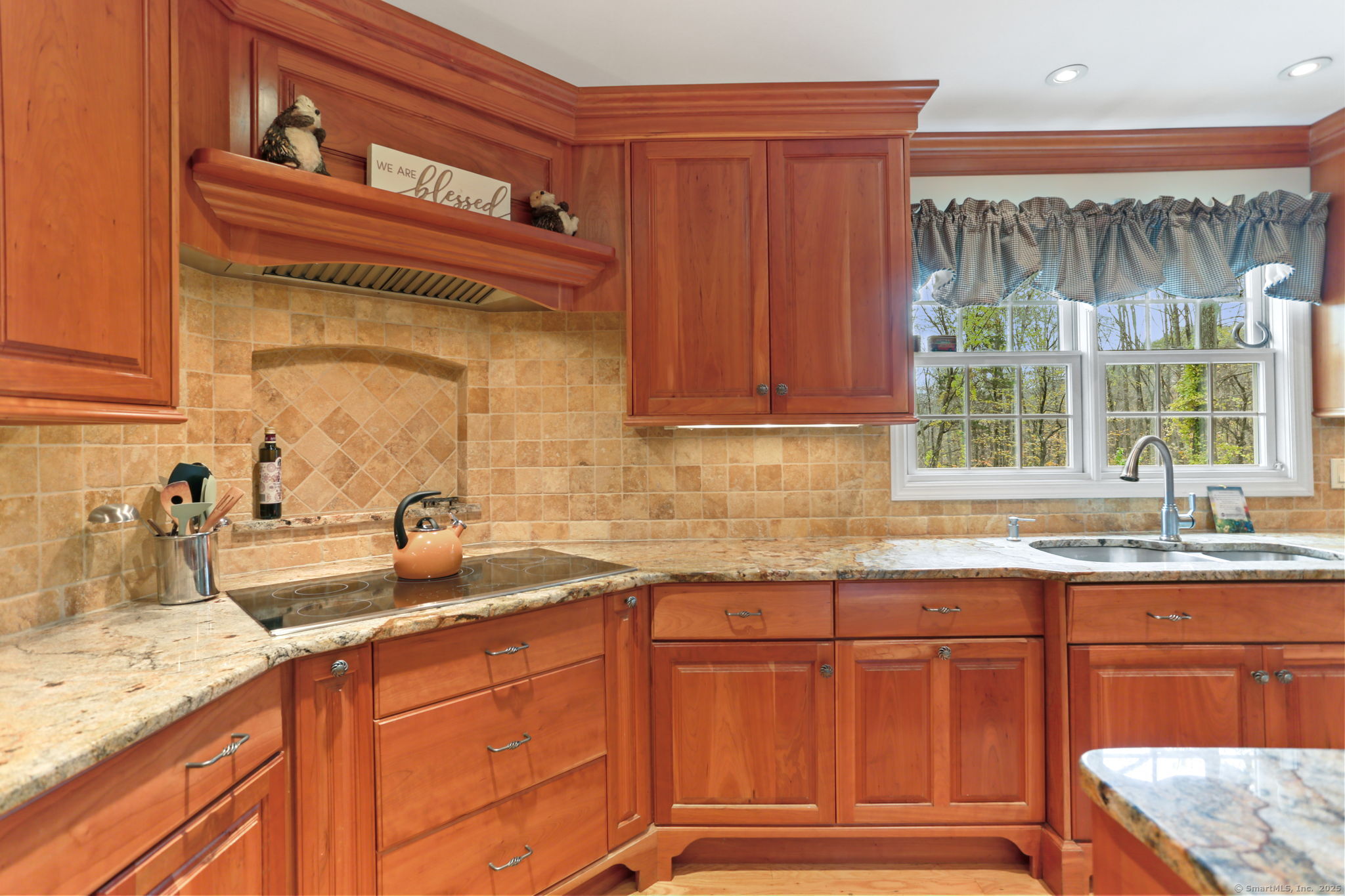 41 Calvin Road Wilton, CT 06897 - Photo 13 of 34 a kitchen with stainless steel appliances granite countertop a sink and a cabinets