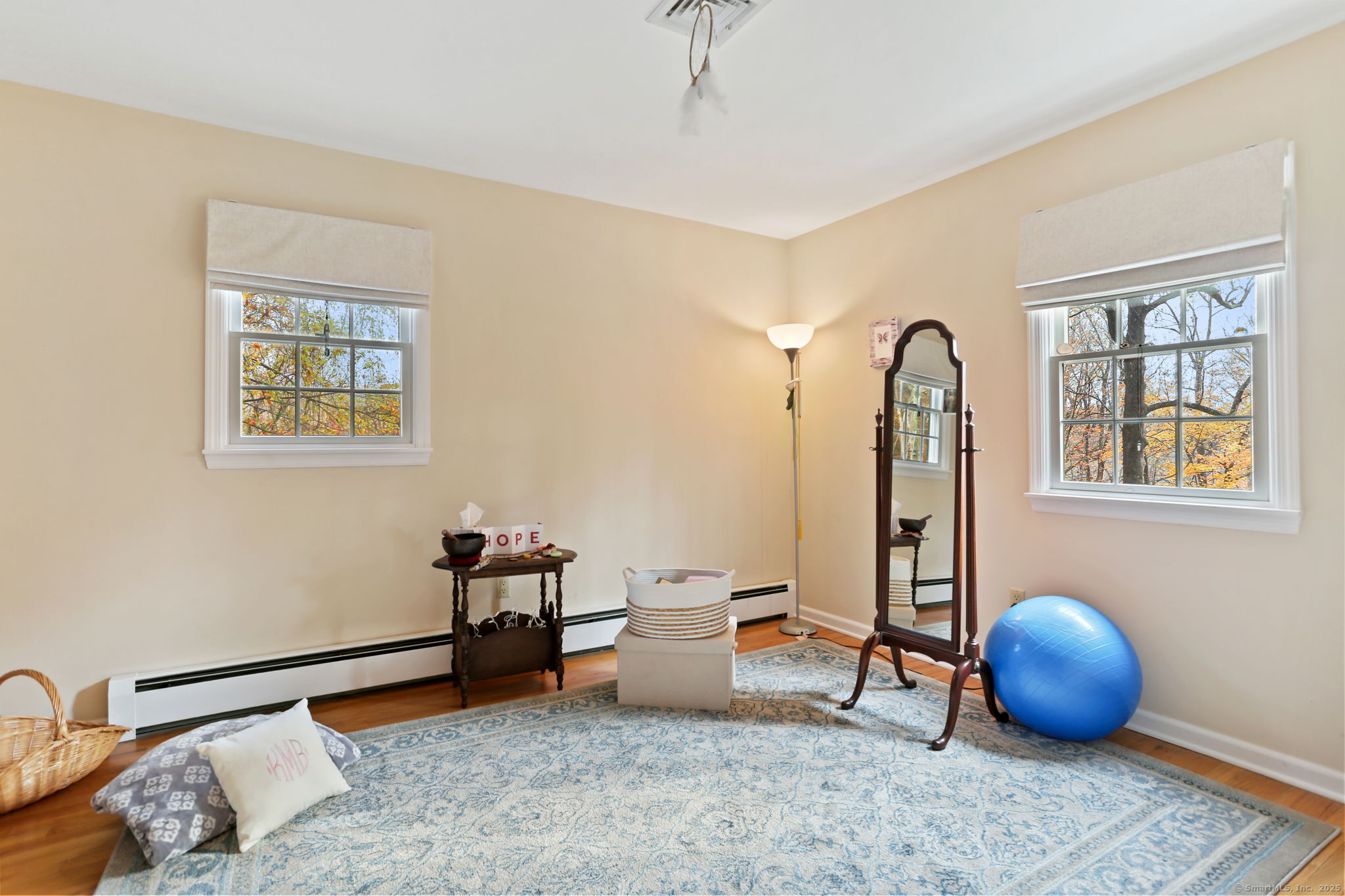 41 Calvin Road Wilton, CT 06897 - Photo 19 of 34 a living room with furniture and a window