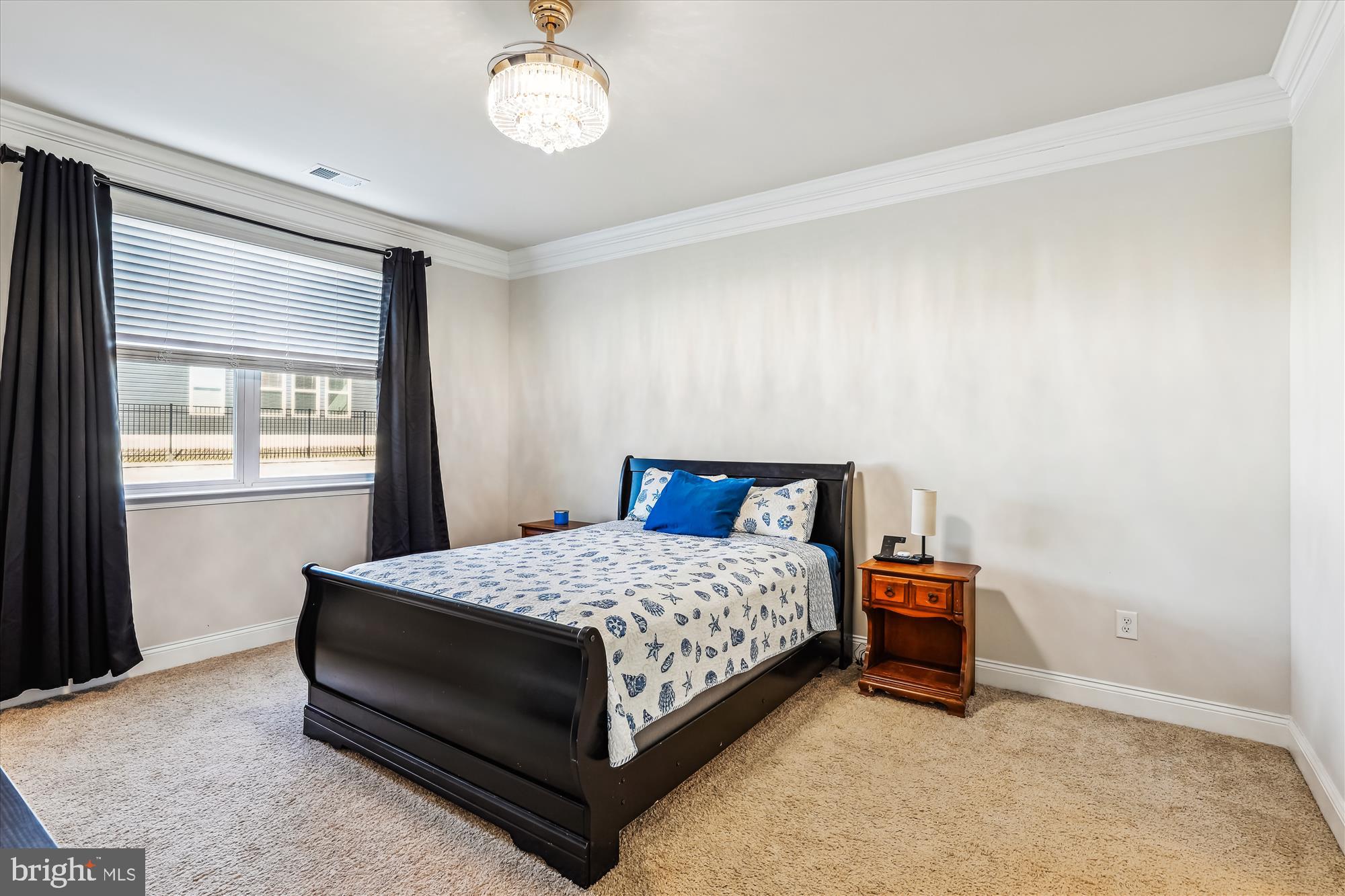 31131 Tigress Road Lewes, DE 19958 - Photo 16 of 45 a bedroom with a bed and a window