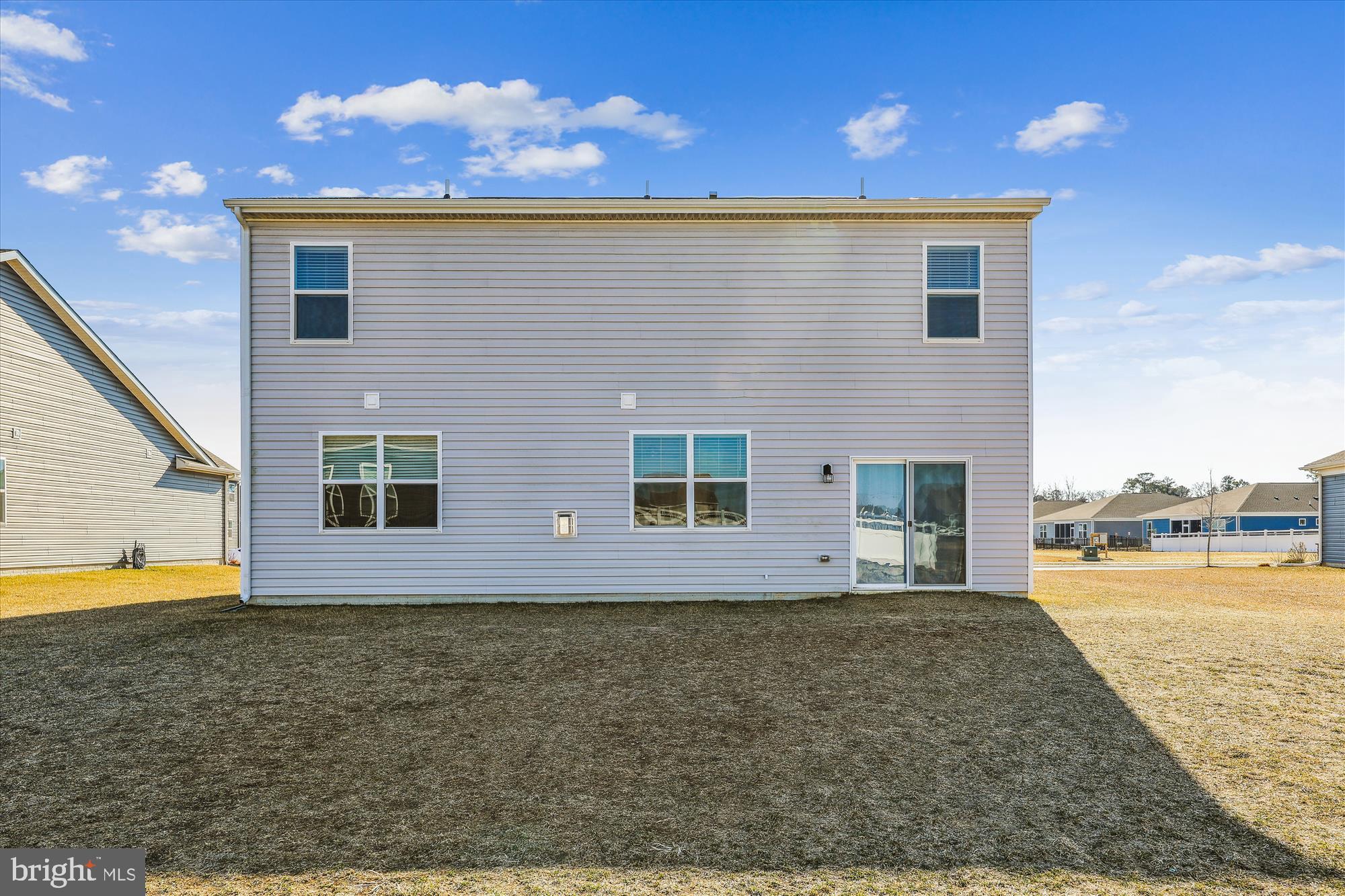 31131 Tigress Road Lewes, DE 19958 - Photo 36 of 45 a view of a house with a yard
