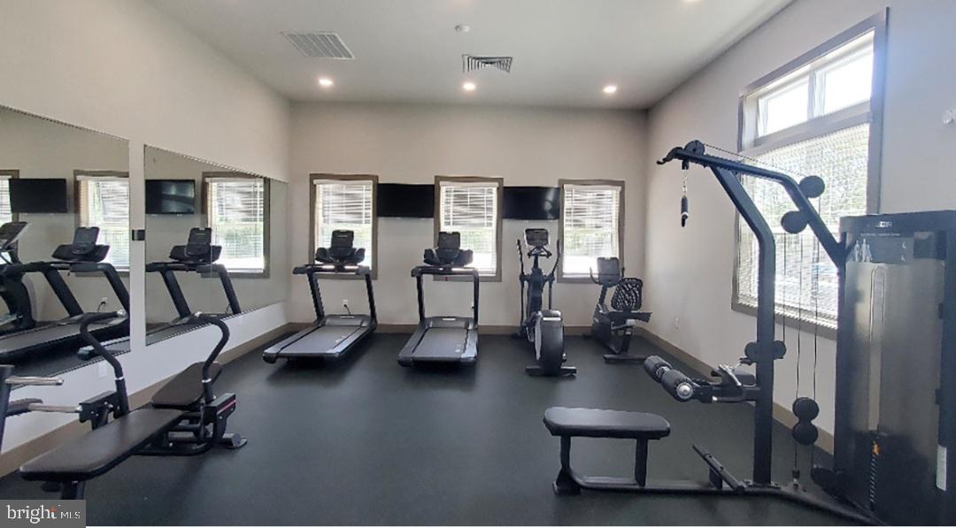 31131 Tigress Road Lewes, DE 19958 - Photo 43 of 45 a view of a livingroom with furniture and a large window
