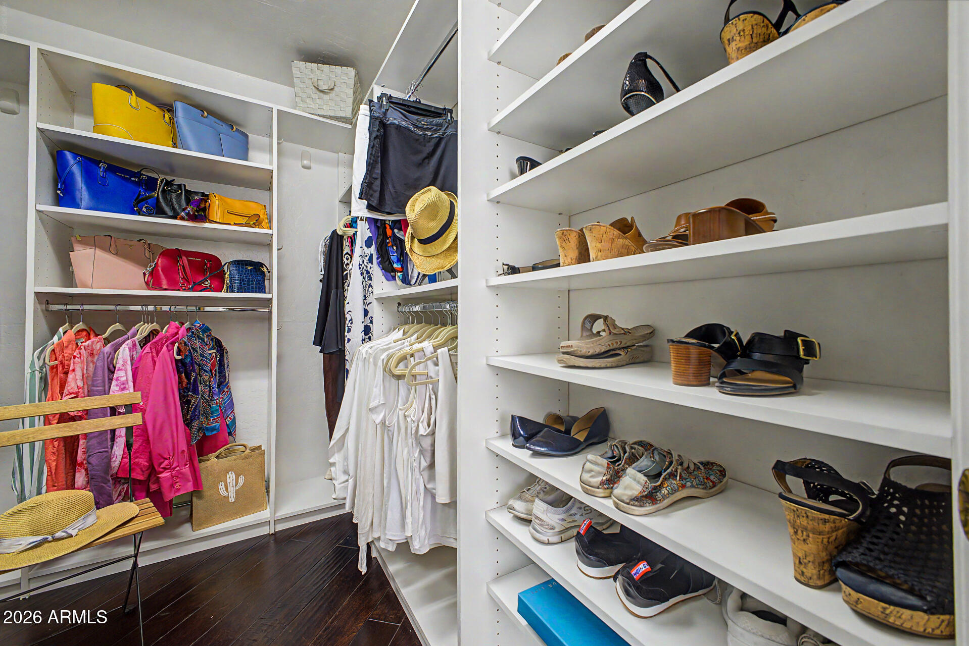 1632 West Frye Road Phoenix, AZ 85045 - Photo 15 of 37 a view of walk in closet with clothes and shoes