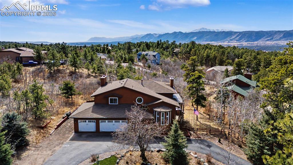 1375 Blueberry Hills Road Monument, CO 80132 - Photo 2 of 50 an aerial view of a house with a yard