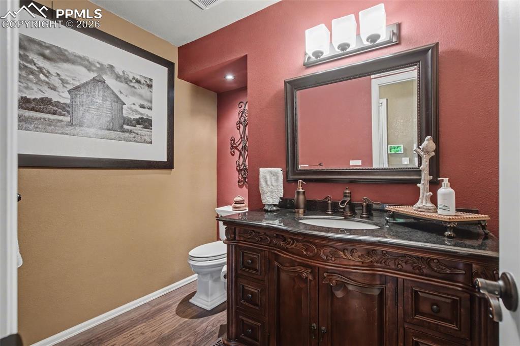 1375 Blueberry Hills Road Monument, CO 80132 - Photo 23 of 50 a bathroom with a sink and a mirror
