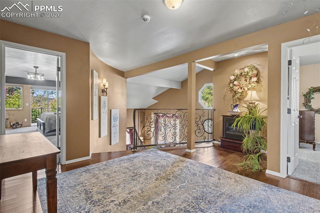 1375 Blueberry Hills Road Monument, CO 80132 - Photo 25 of 50 a view of livingroom with furniture and window