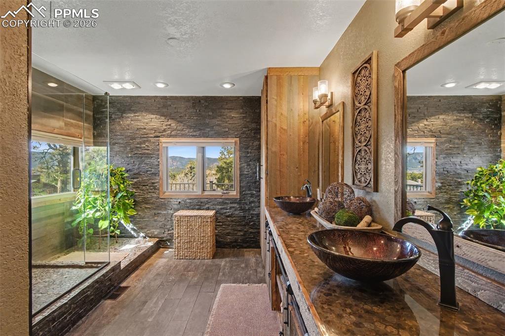 1375 Blueberry Hills Road Monument, CO 80132 - Photo 29 of 50 a living room with furniture and a potted plant