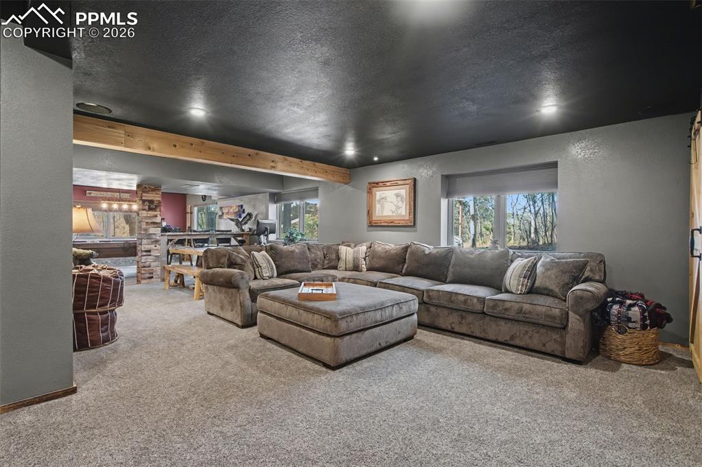 1375 Blueberry Hills Road Monument, CO 80132 - Photo 39 of 50 a living room with furniture and a large window