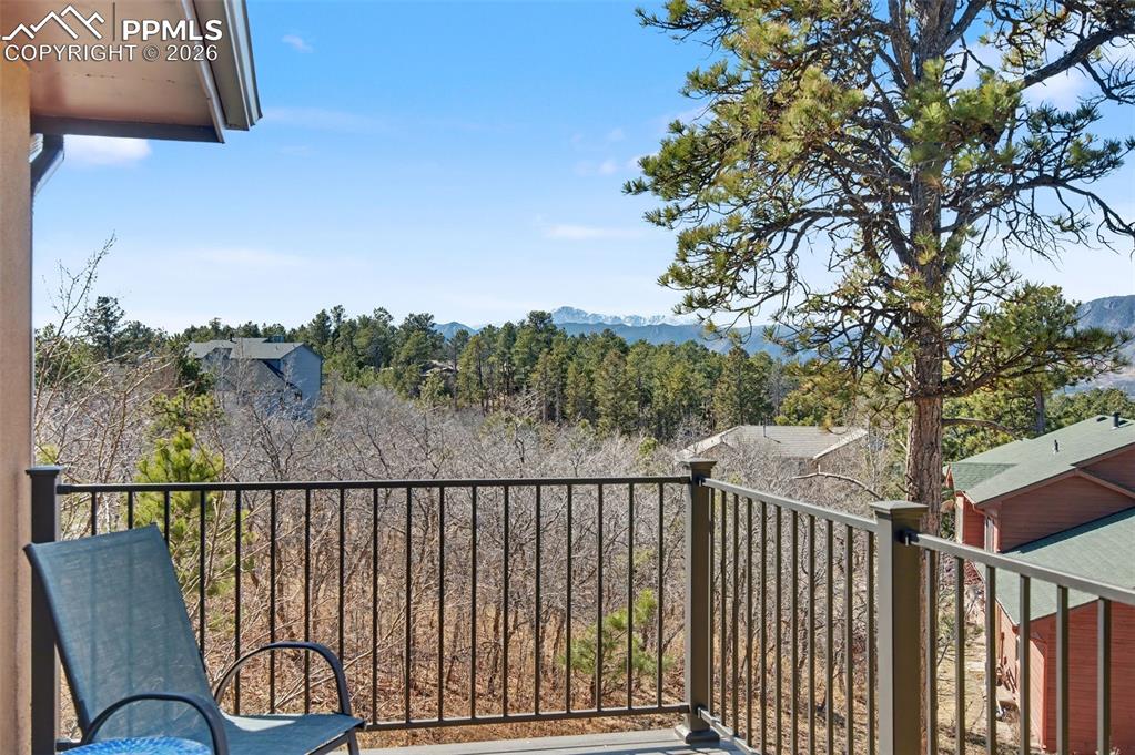 1375 Blueberry Hills Road Monument, CO 80132 - Photo 48 of 50 a balcony with wooden floor and fence