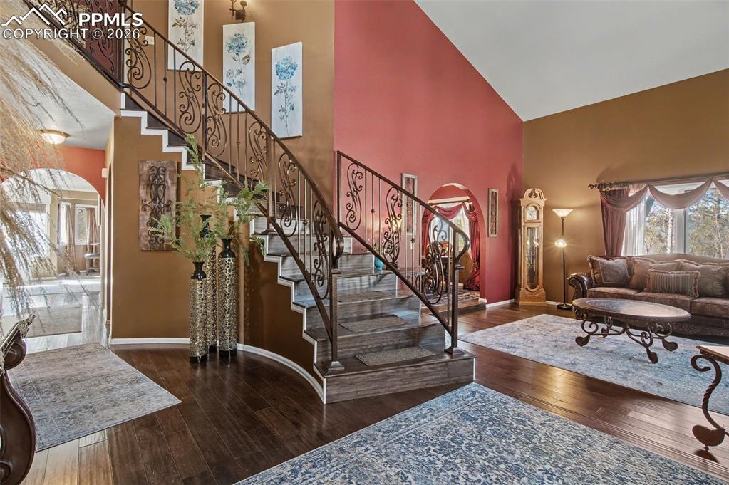 1375 Blueberry Hills Road Monument, CO 80132 - Photo 7 of 50 a view of entryway and hall with wooden floor