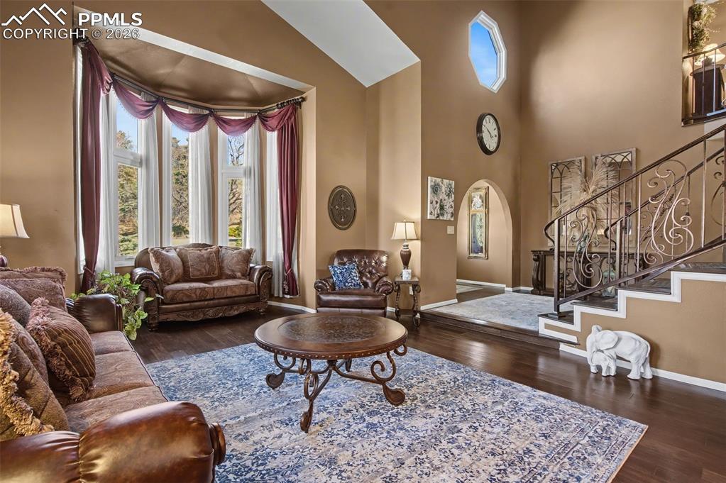 1375 Blueberry Hills Road Monument, CO 80132 - Photo 8 of 50 a living room with furniture and a large window