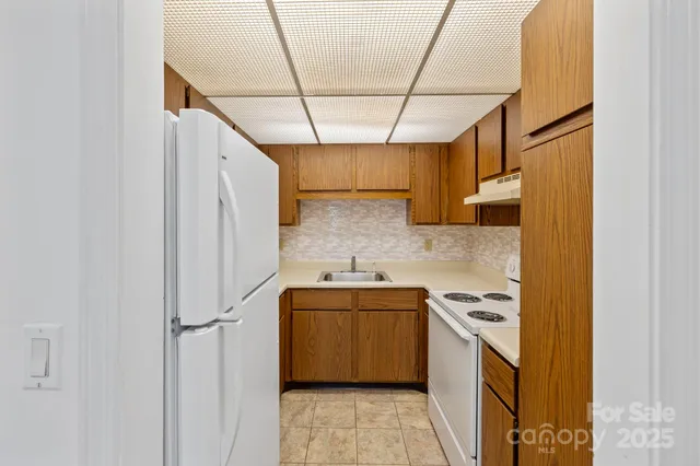 a kitchen with a stove and a microwave