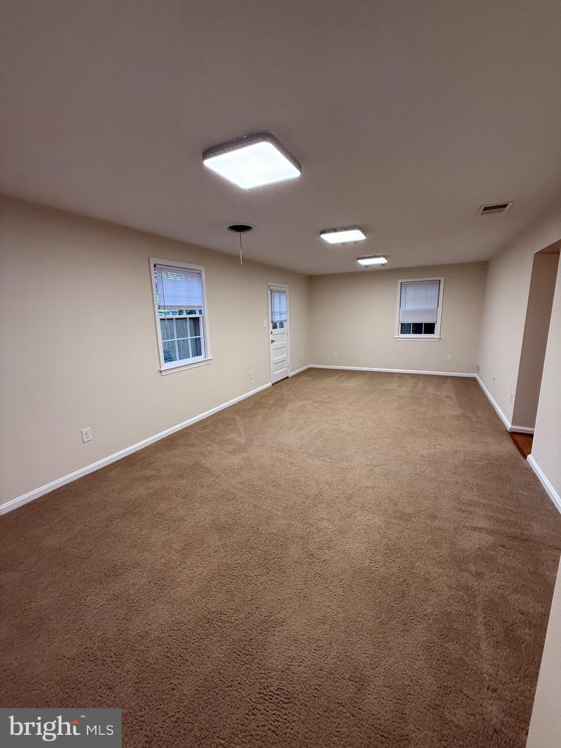 6209 Redwing Road Bethesda, MD 20817 - Photo 14 of 27 wooden floor in an empty room