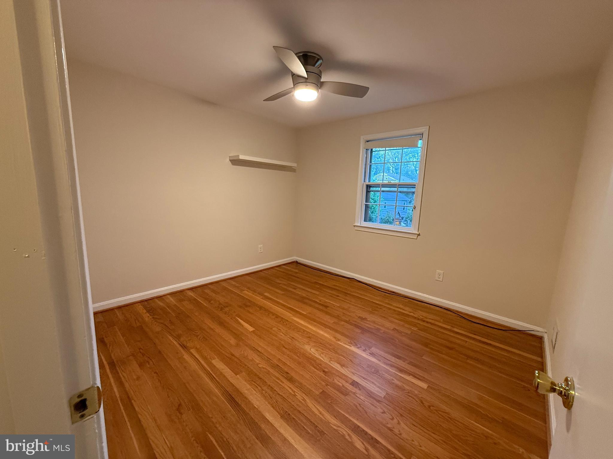 6209 Redwing Road Bethesda, MD 20817 - Photo 19 of 27 wooden floor in an empty room