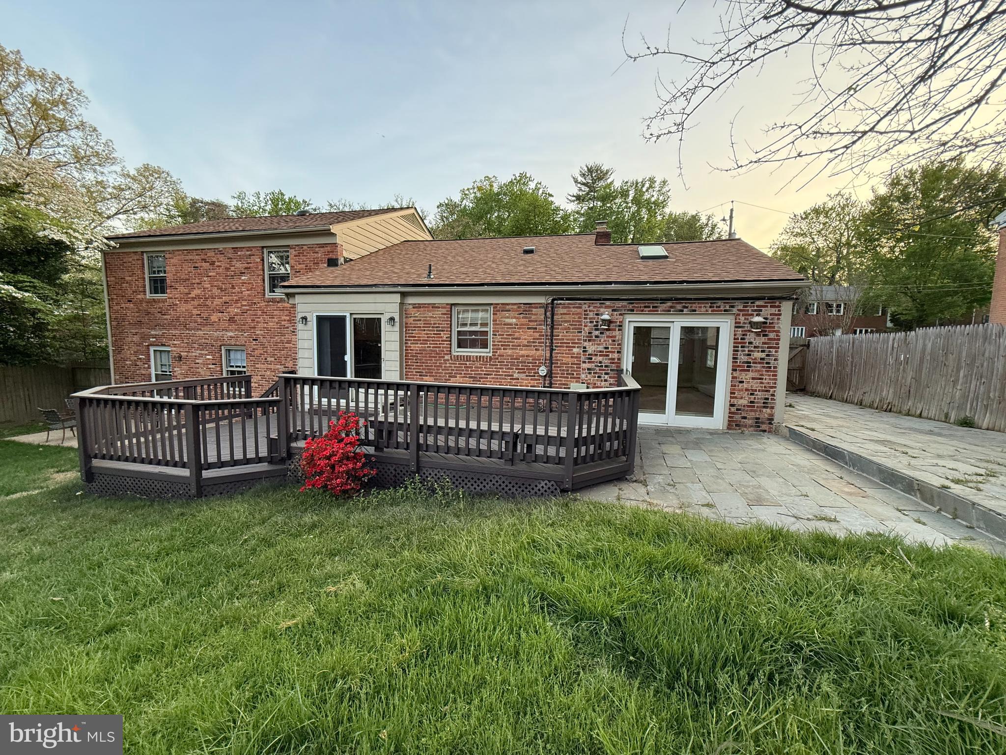 6209 Redwing Road Bethesda, MD 20817 - Photo 25 of 27 a view of a house with a yard and a porch