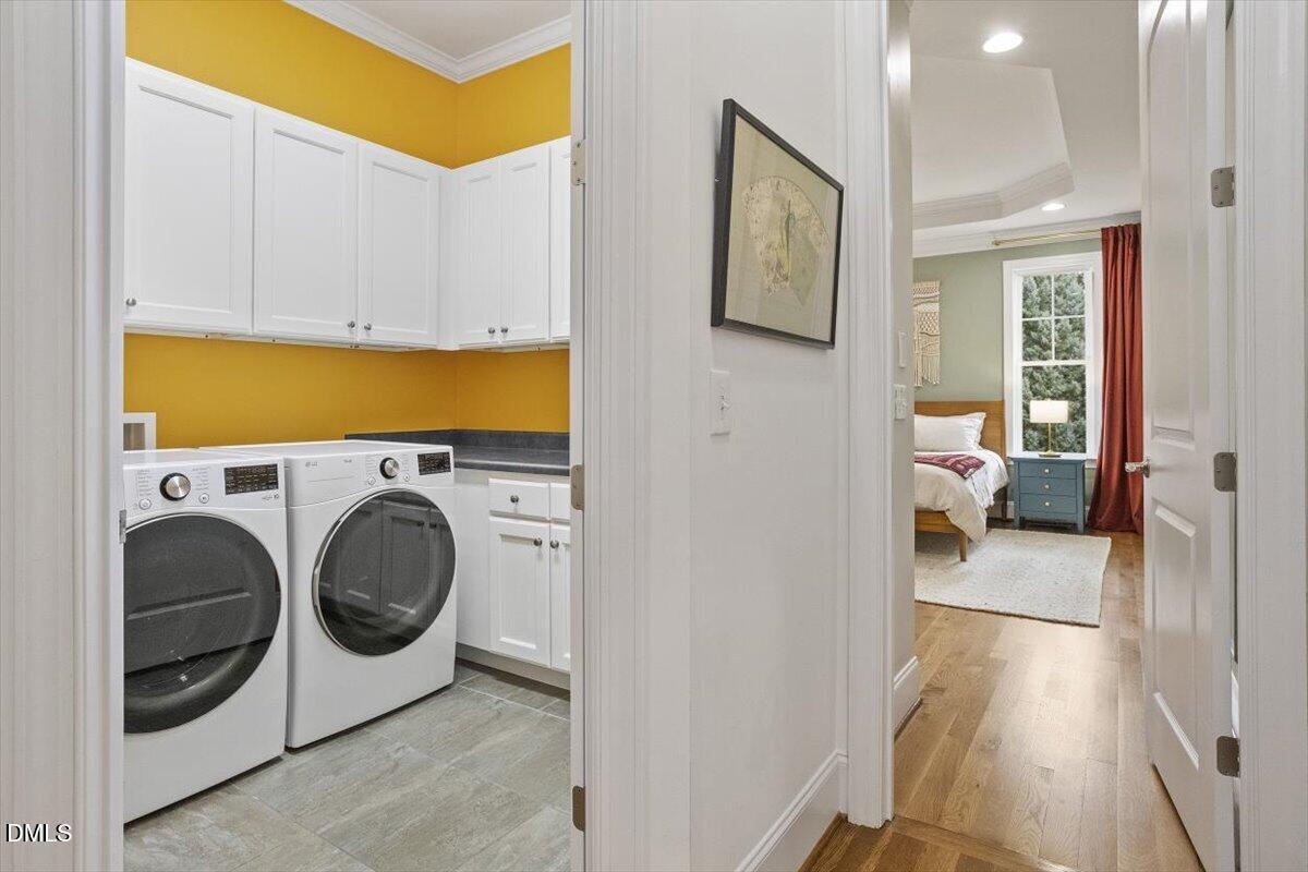 904 Prairie Smoke Street Wake Forest, NC 27587 - Photo 30 of 61 a view of a hallway with washer and dryer