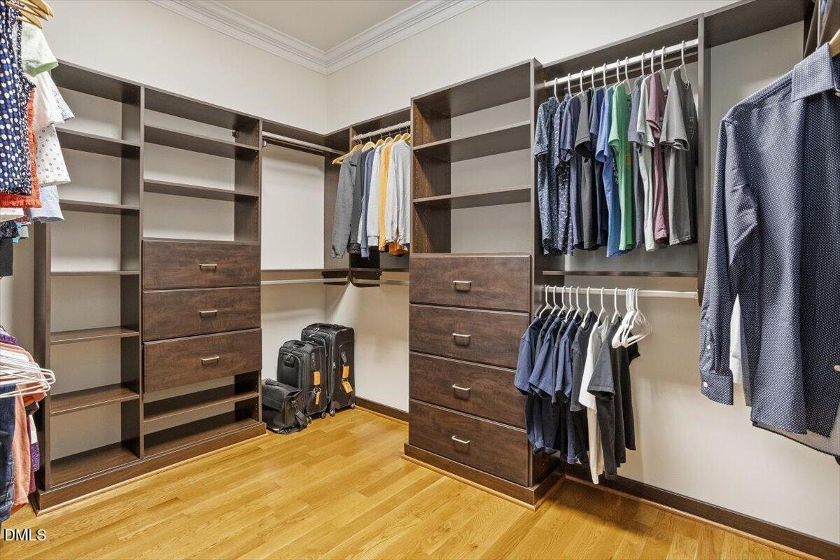 904 Prairie Smoke Street Wake Forest, NC 27587 - Photo 39 of 61 a view of walk in closet with clothes and shoes