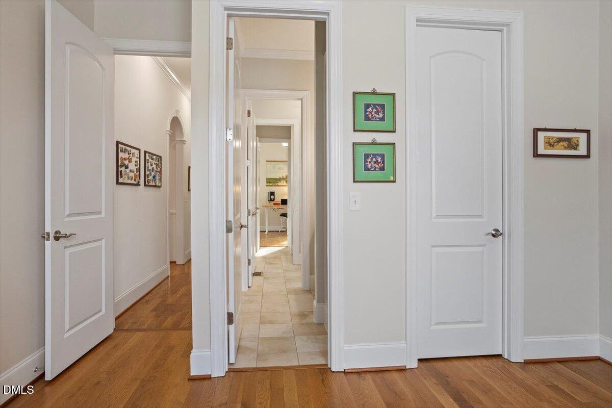 904 Prairie Smoke Street Wake Forest, NC 27587 - Photo 45 of 61 a view of a hallway with wooden floor and closet
