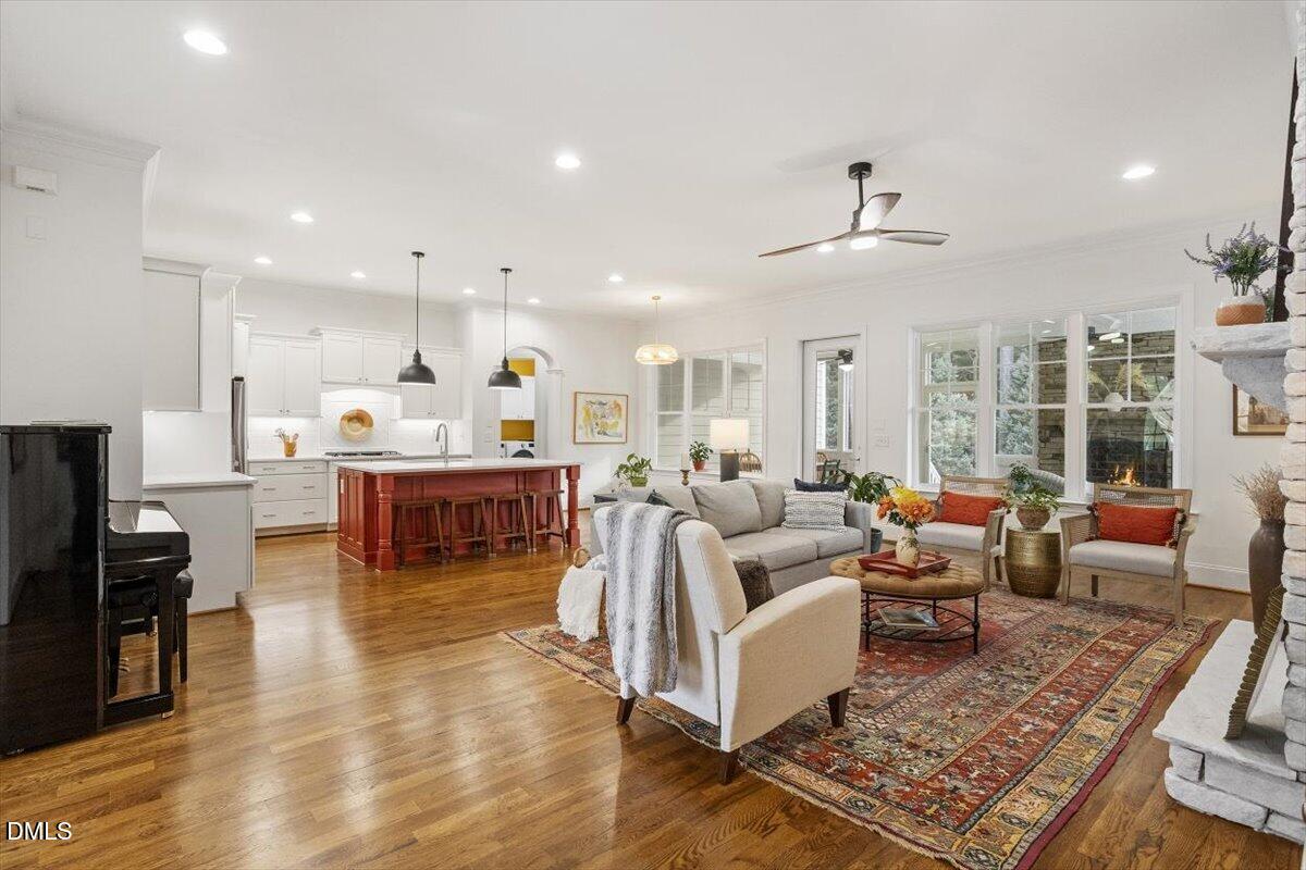 904 Prairie Smoke Street Wake Forest, NC 27587 - Photo 5 of 61 a living room with lots of furniture and kitchen view