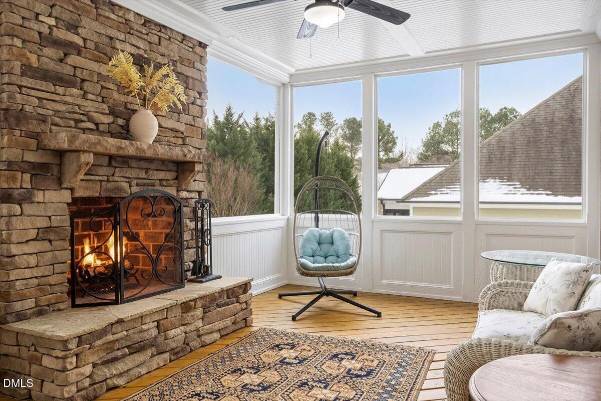 904 Prairie Smoke Street Wake Forest, NC 27587 - Photo 54 of 61 a living room filled with furniture and a fireplace