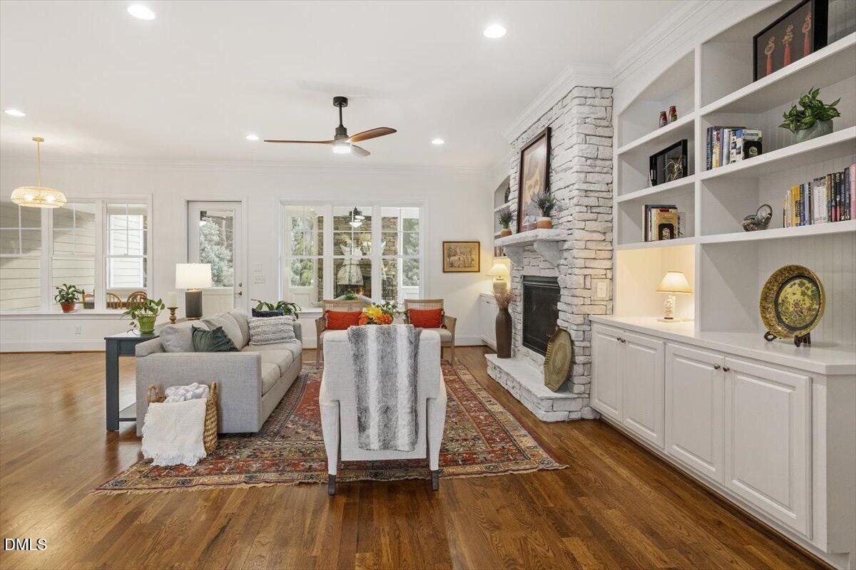 904 Prairie Smoke Street Wake Forest, NC 27587 - Photo 6 of 61 a living room with furniture and a fireplace