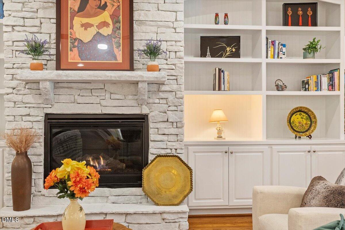 904 Prairie Smoke Street Wake Forest, NC 27587 - Photo 7 of 61 a living room with furniture and a fireplace