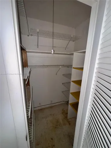 a view of a room with rack on the wall