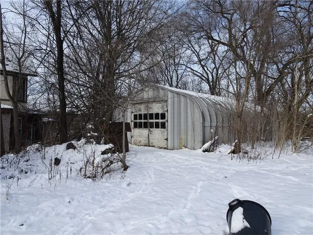 a view of a covered with snow in the yard