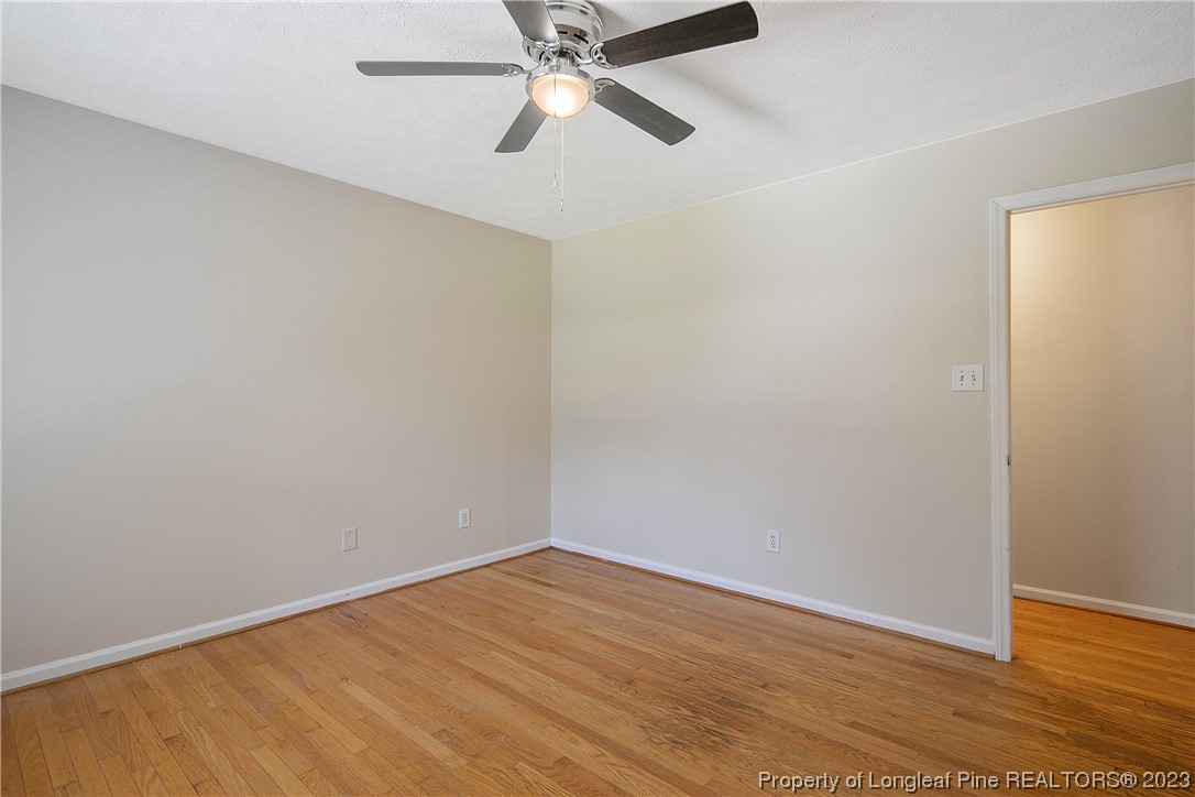 624 Porter Road Hope Mills, NC 28348 - Photo 31 of 45 a view of an empty room with wooden floor