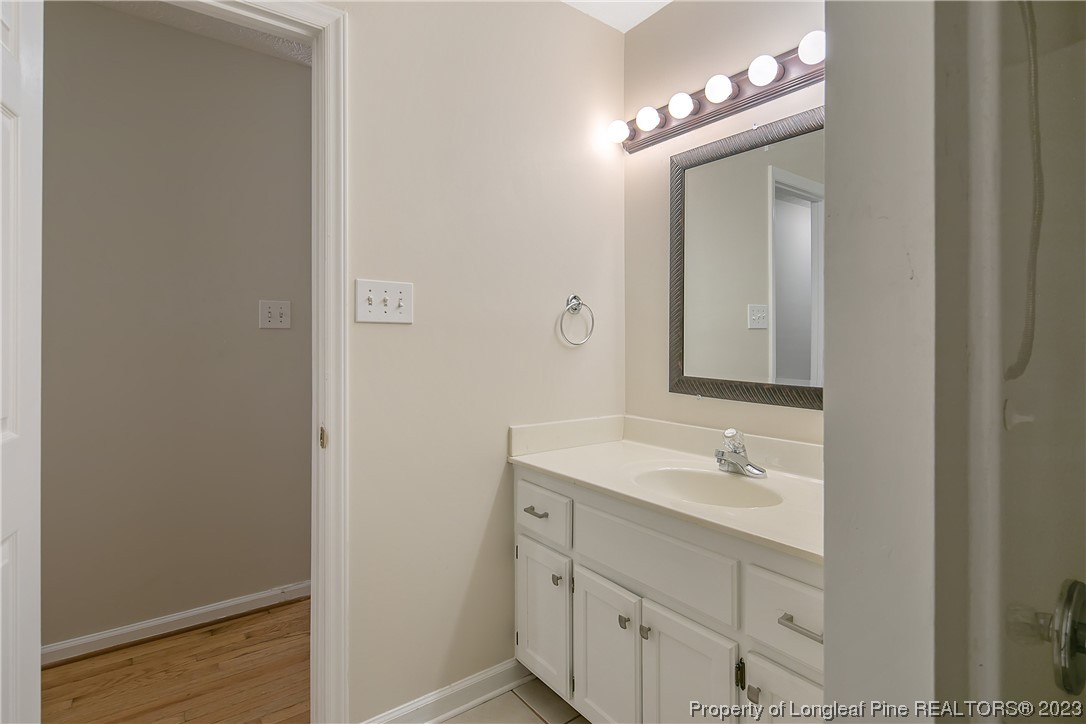 624 Porter Road Hope Mills, NC 28348 - Photo 36 of 45 a bathroom with a sink and a mirror