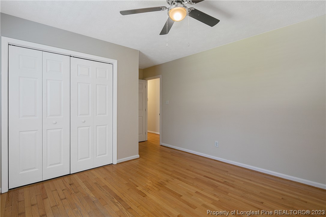 624 Porter Road Hope Mills, NC 28348 - Photo 39 of 45 a view of an empty room with wooden floor