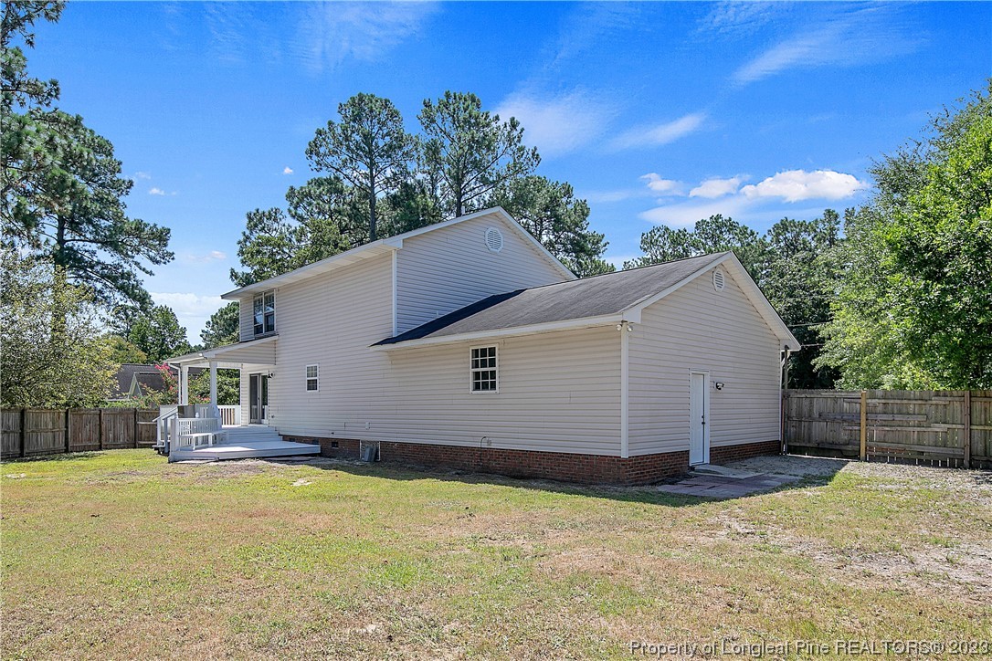 624 Porter Road Hope Mills, NC 28348 - Photo 44 of 45 a view of a house with backyard and tree