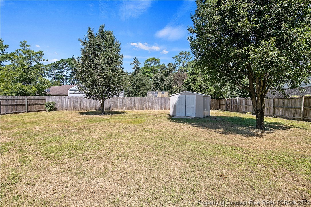 624 Porter Road Hope Mills, NC 28348 - Photo 45 of 45 a swimming pool is sitting in the middle of a yard