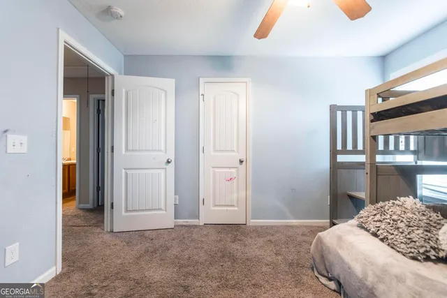 a backyard of a house with outdoor seating