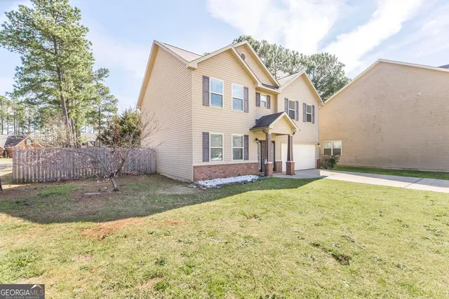 a house view with a outdoor space
