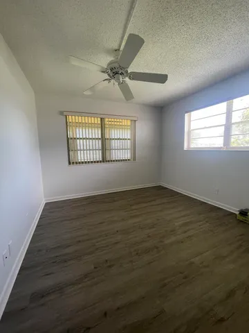 a bathroom with a sink a toilet and bathtub
